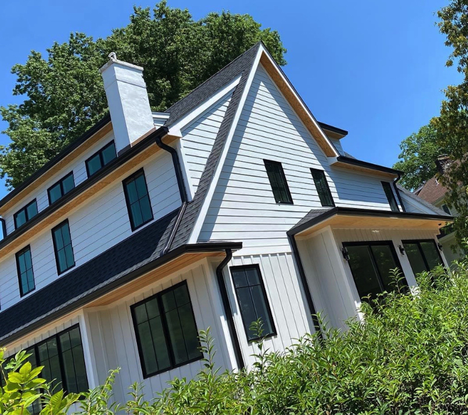 black gutters on white house scarsdale ny