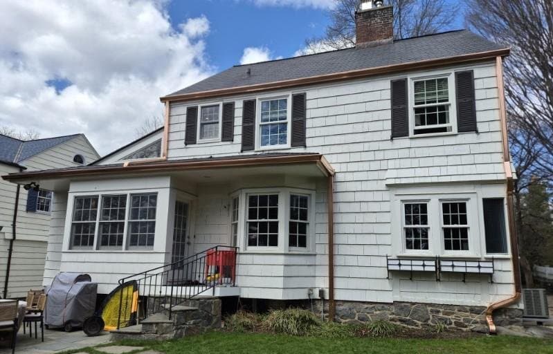 Copper Gutters on a White Cedar Shake Home